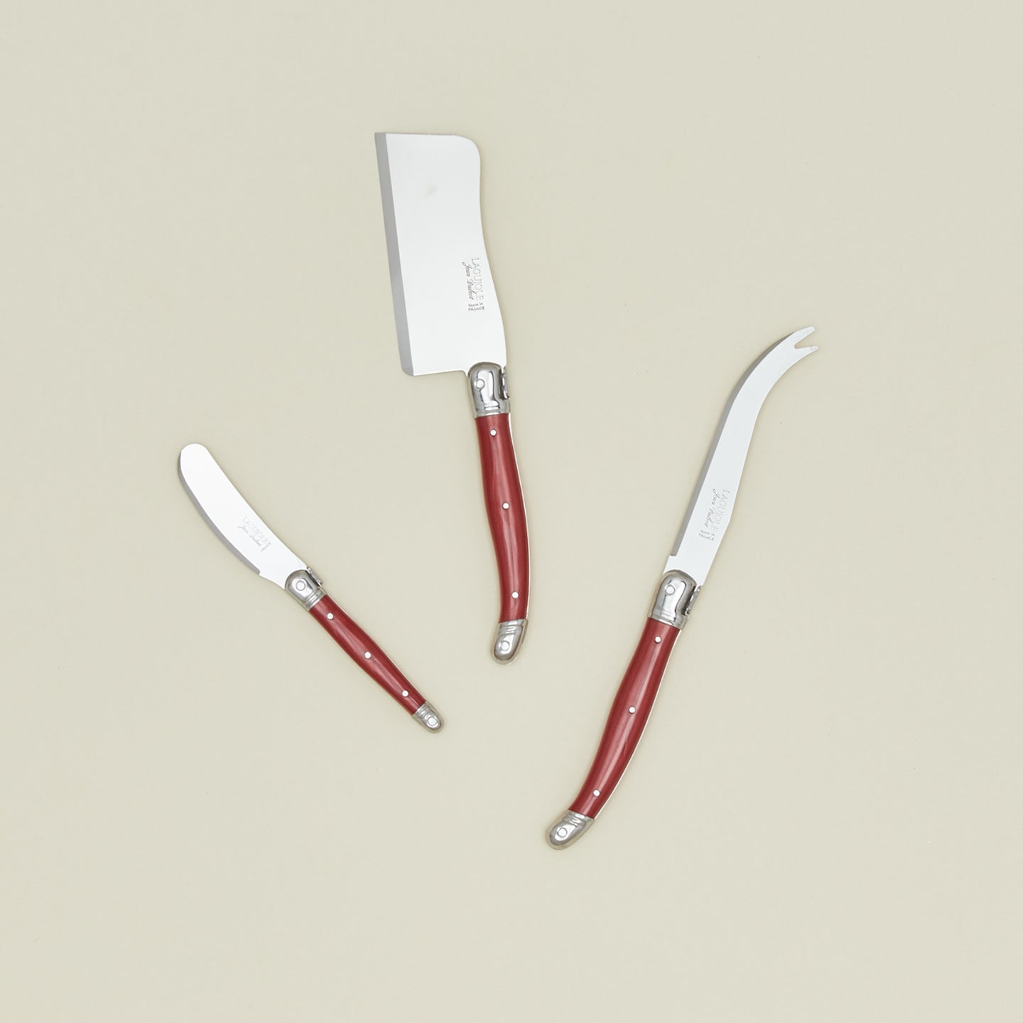 Jean Dubost cheese knives in red