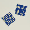 Parquet potholder and dots and dashes potholders in blue and yellow