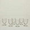 Six Artois wine glasses.