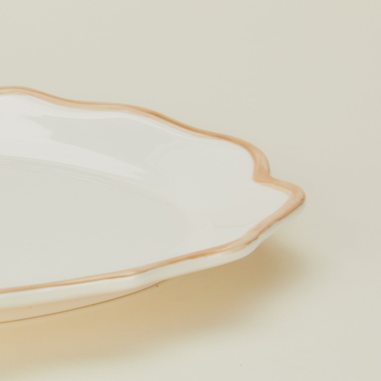Detailed view of ogee edge oval platter