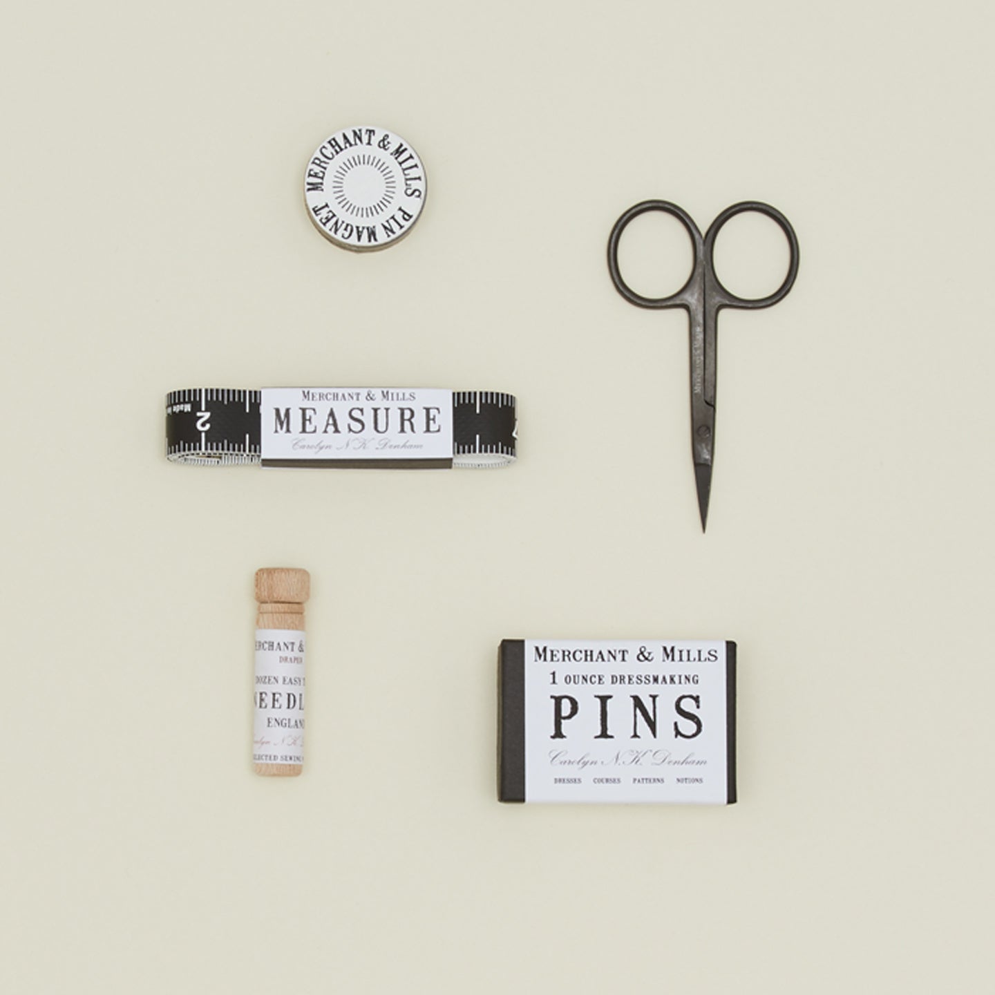 Sewing needles, scissors, pins and measuring tape