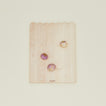 Overhead view of medium scalloped cutting board with radishes
