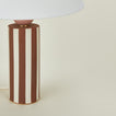 Close up view of Pillar table lamp with brick stripe
