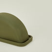 Close up view of curve butter dish in moss