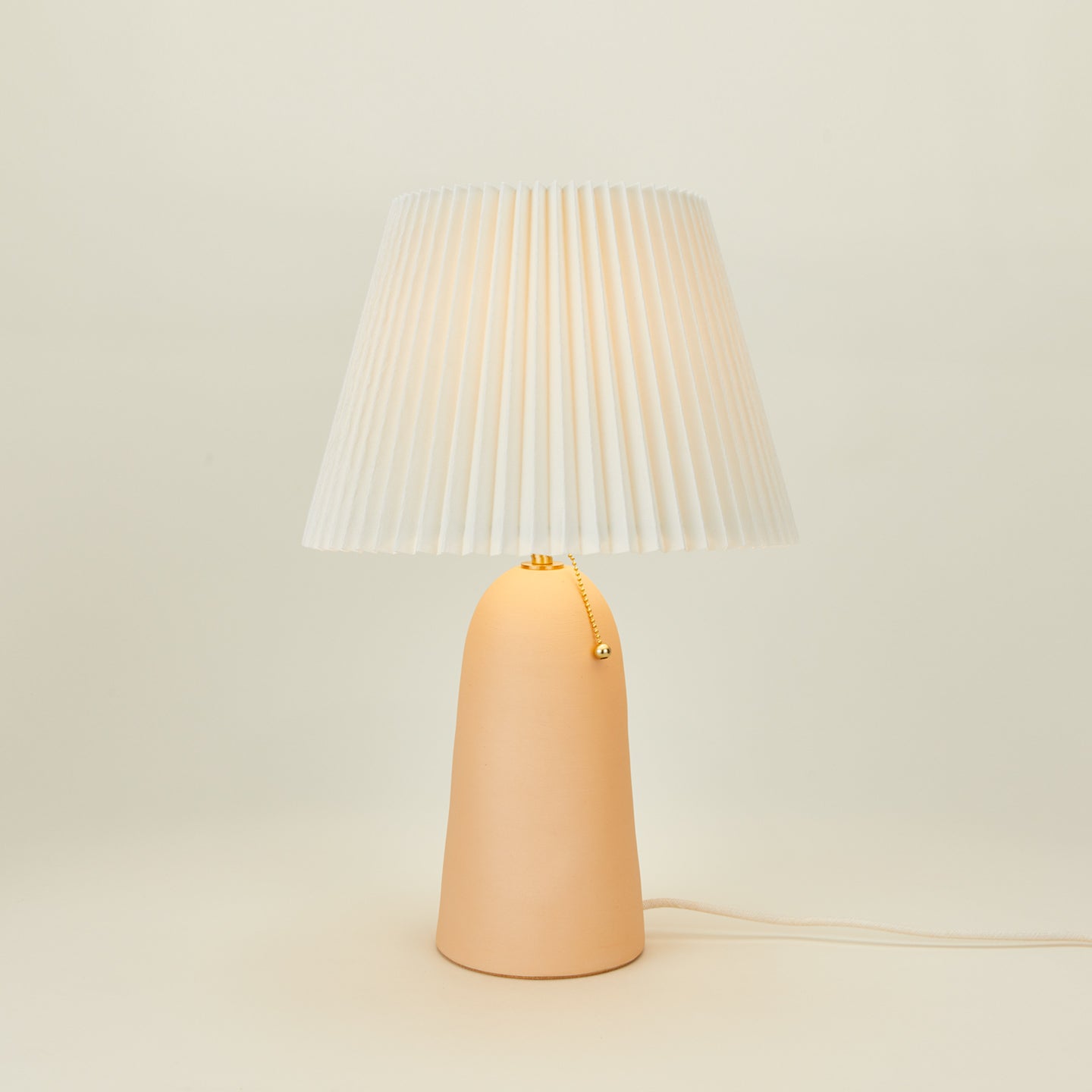 Peach Pleat Table Lamp with Ivory Shade