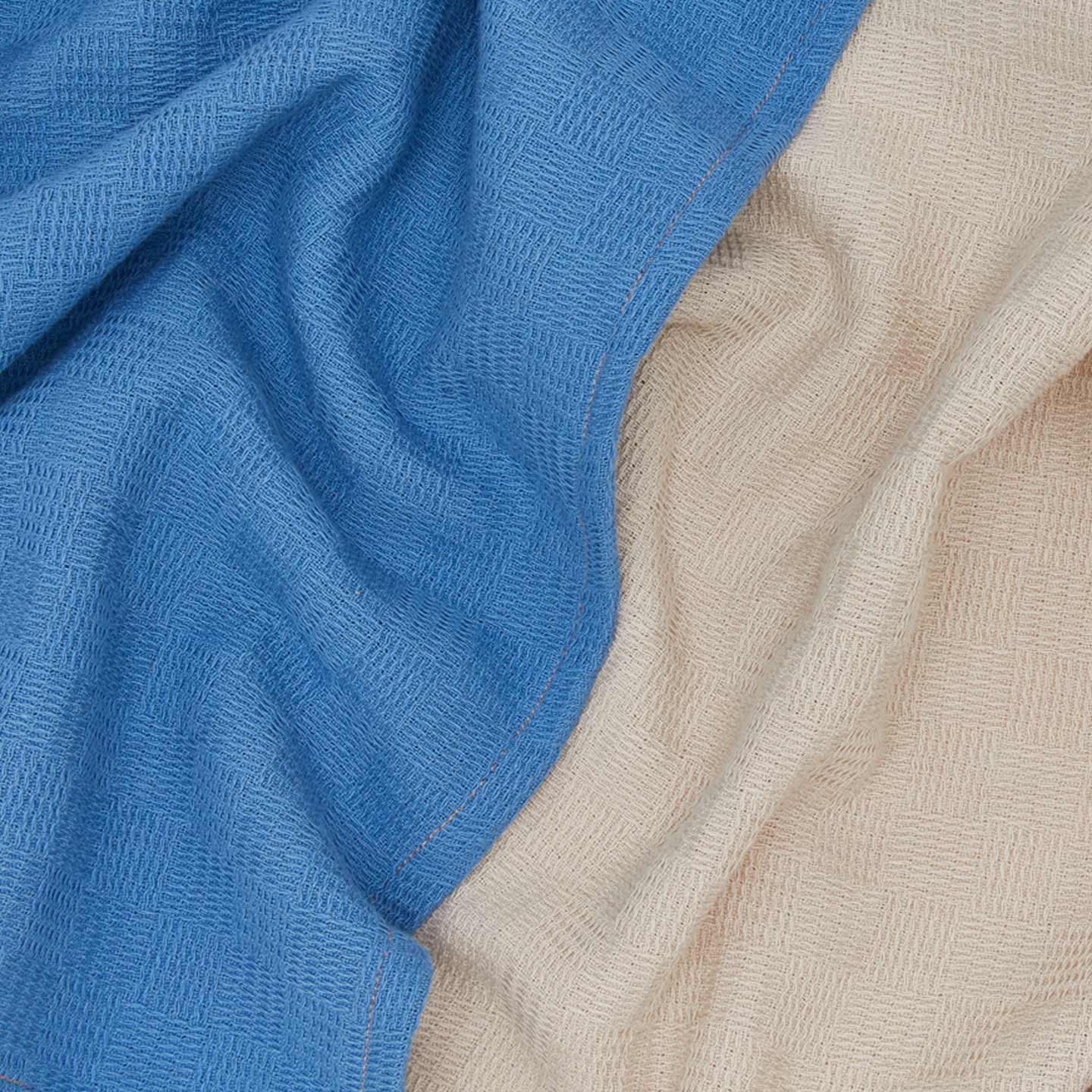 Close up view of Woven stripe kitchen towels in sky and ivory