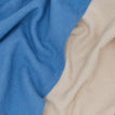 Close up view of Woven stripe kitchen towels in sky and ivory