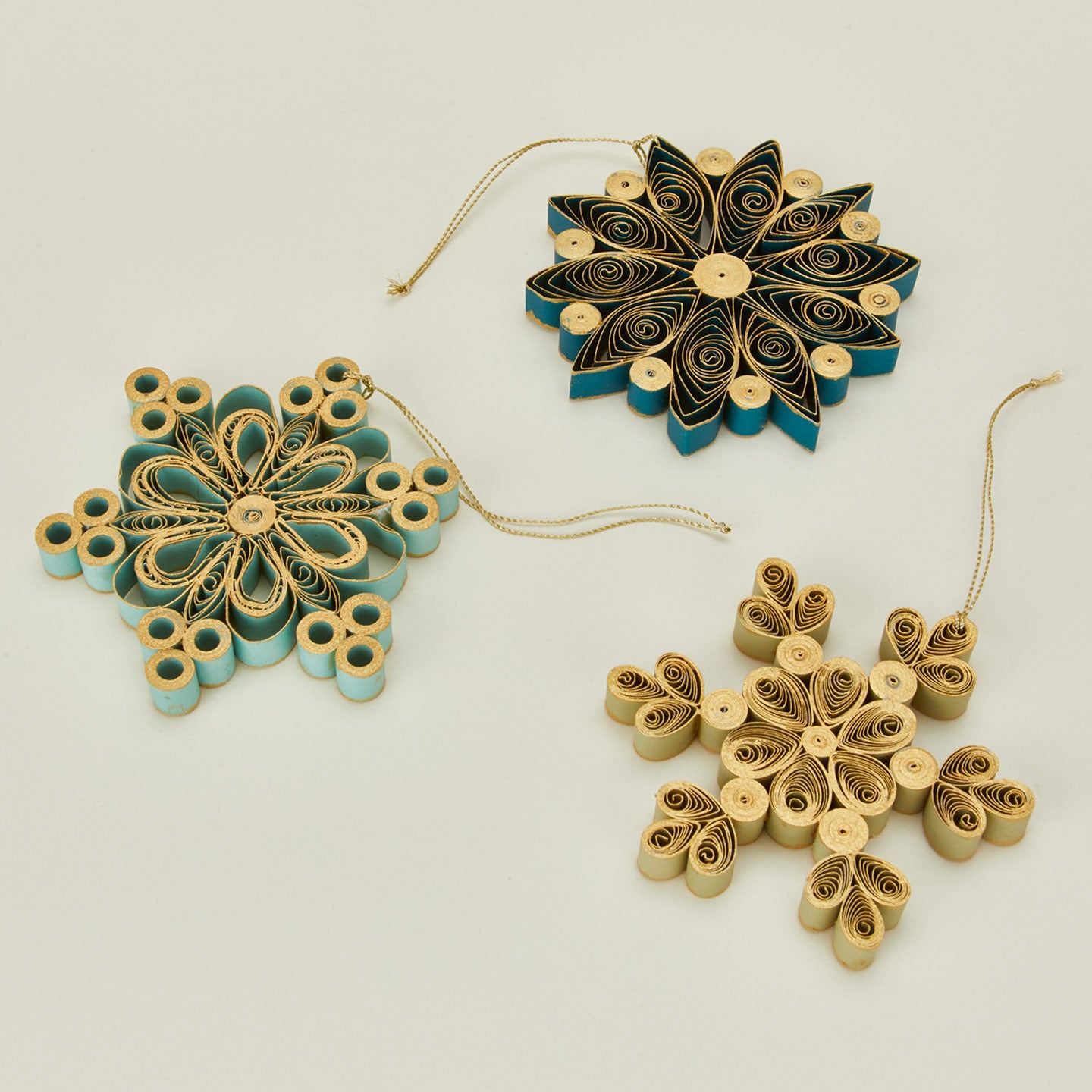Quilled snowflake ornaments in cool