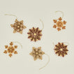 Quilled snowflake ornaments in warm