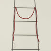 Wood beaded garland in red on ladder