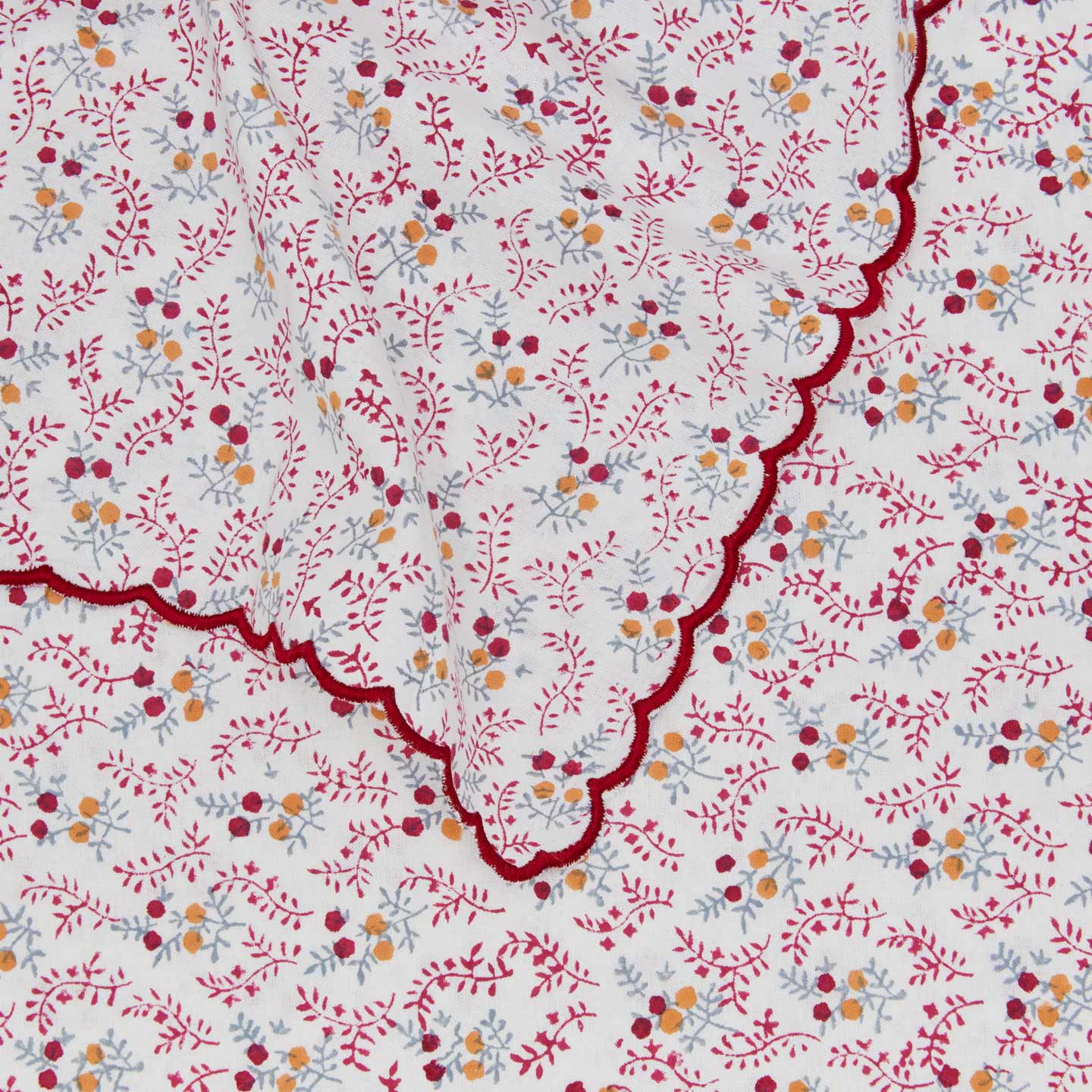 Close up view of little flowers rectangular tablecloth in maroon