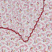 Close up view of little flowers rectangular tablecloth in maroon