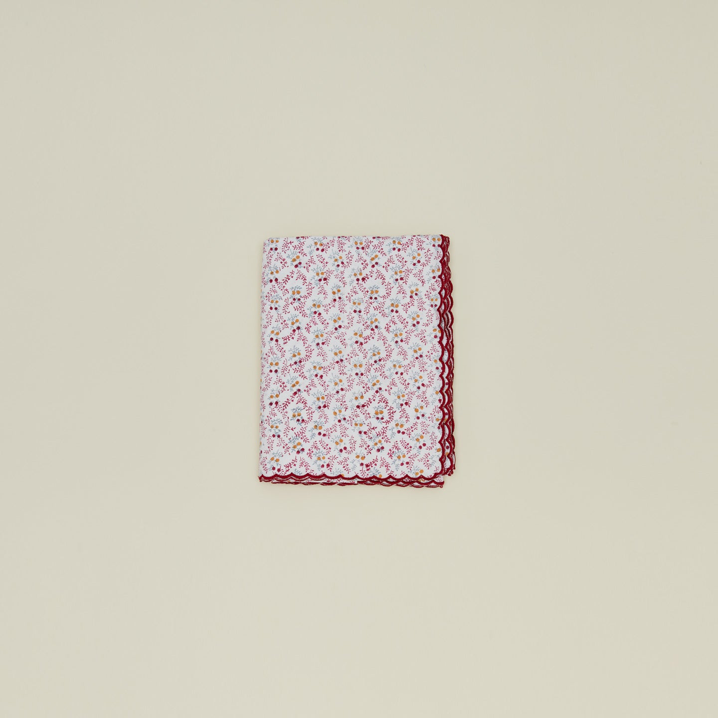 Little flowers rectangular tablecloth in maroon.