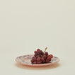 Splatter dinner plate in pink and blue with grapes