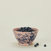 Splatter small bowl in pink and blue with blueberries