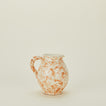 Splatter cigno jug in tan and ivory