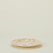 Splatter dinner plate in tan and ivory