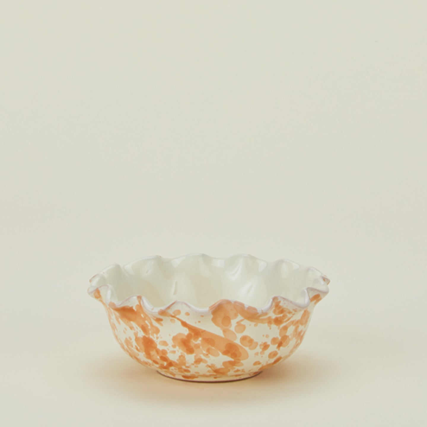 Splatter scallop bowl in tan and ivory