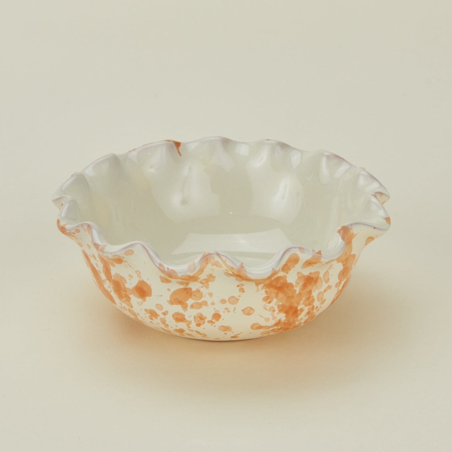 Splatter scallop bowl in tan and ivory