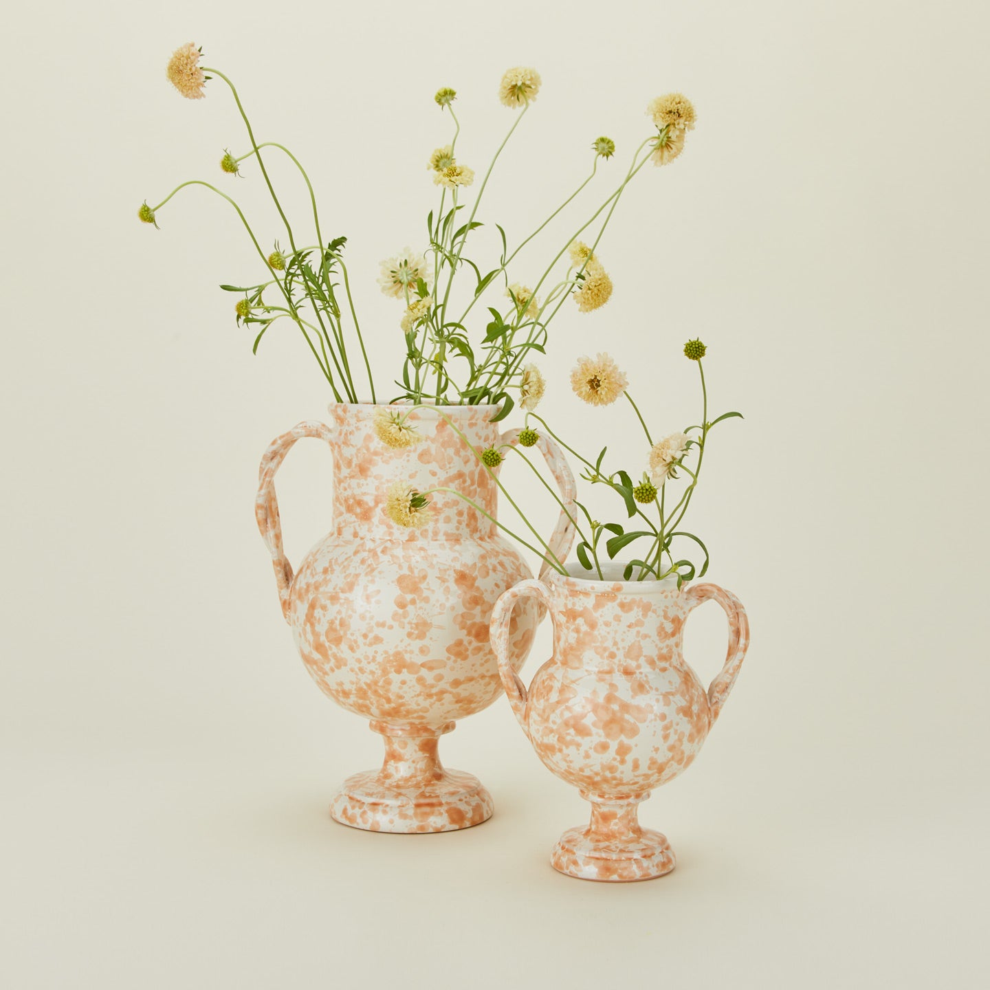 Small and large verona vases in tand and ivory with florals