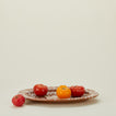 Splatter terracotta and ivory oval platter with tomatoes