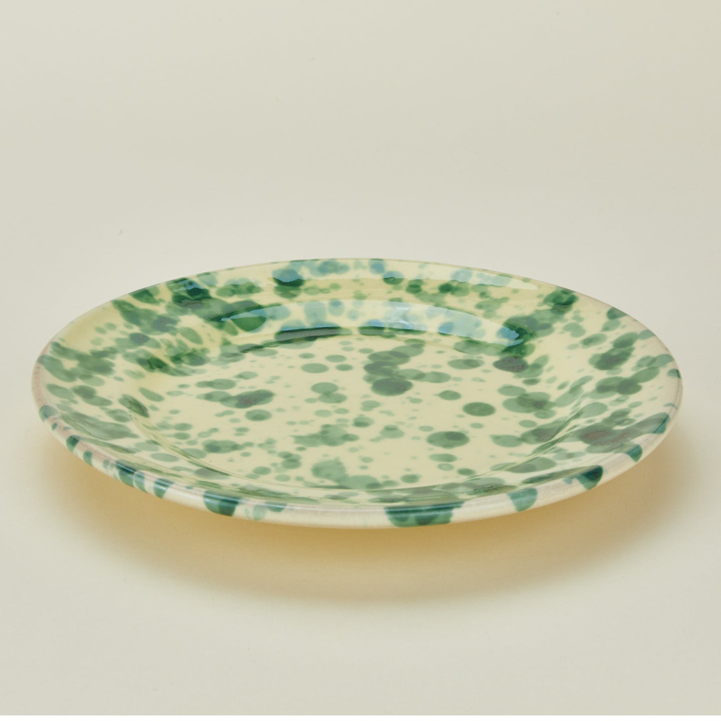 Splatter dinner plate in yellow and green
