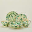 Splatter dinnerware family in yellow and green.