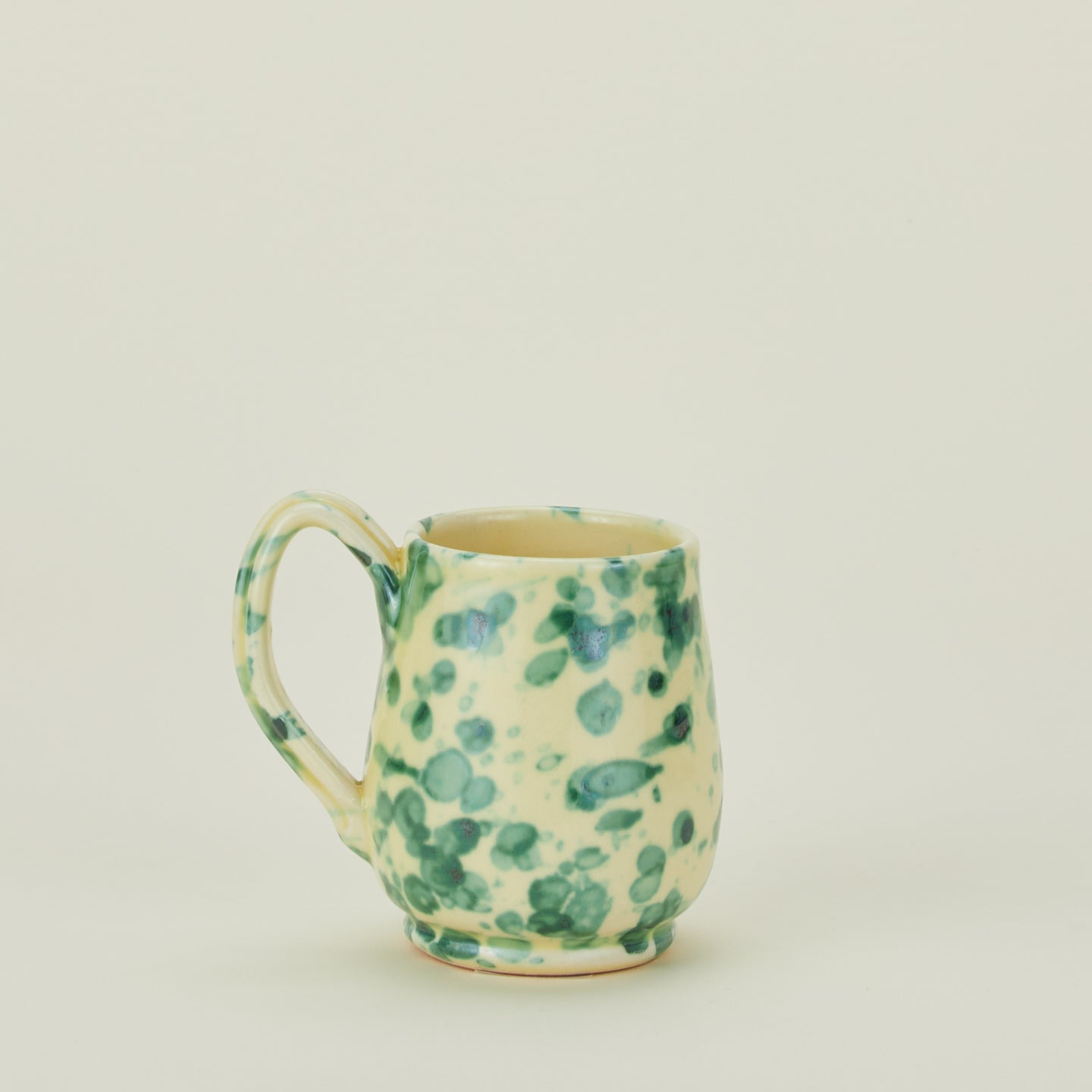 Splatter mug in yellow and green