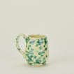 Splatter mug in yellow and green