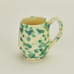 Splatter mug in yellow and green