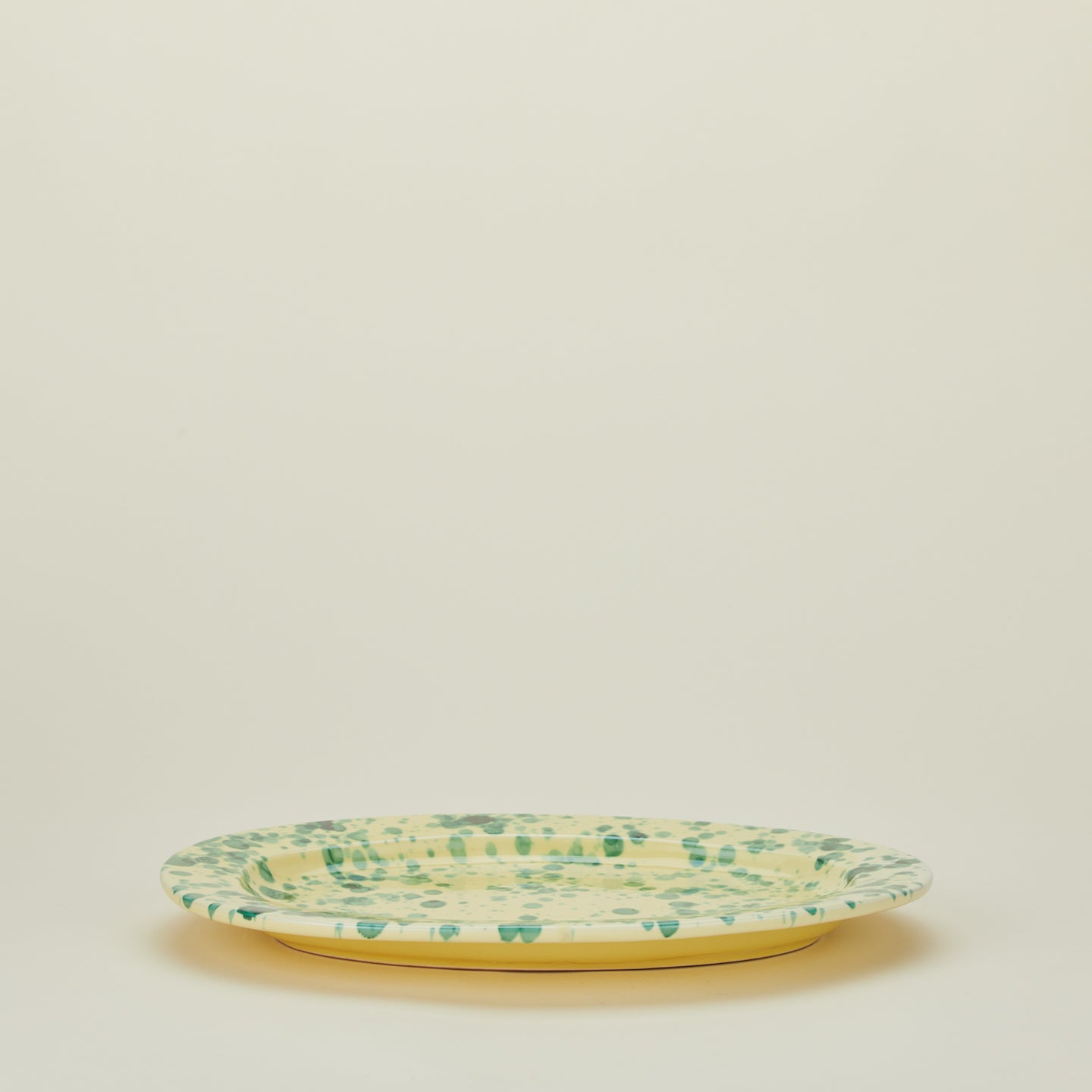 Splatter yellow and green oval platter 