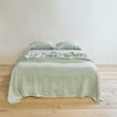 Simple linen bedding in sage