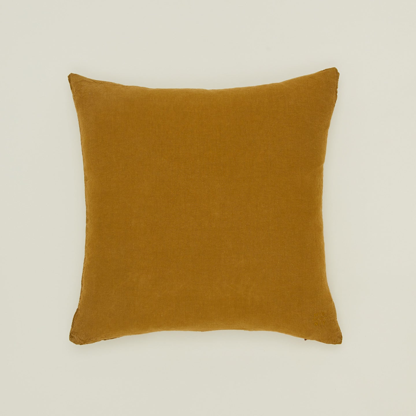 Simple linen pillow in bronze