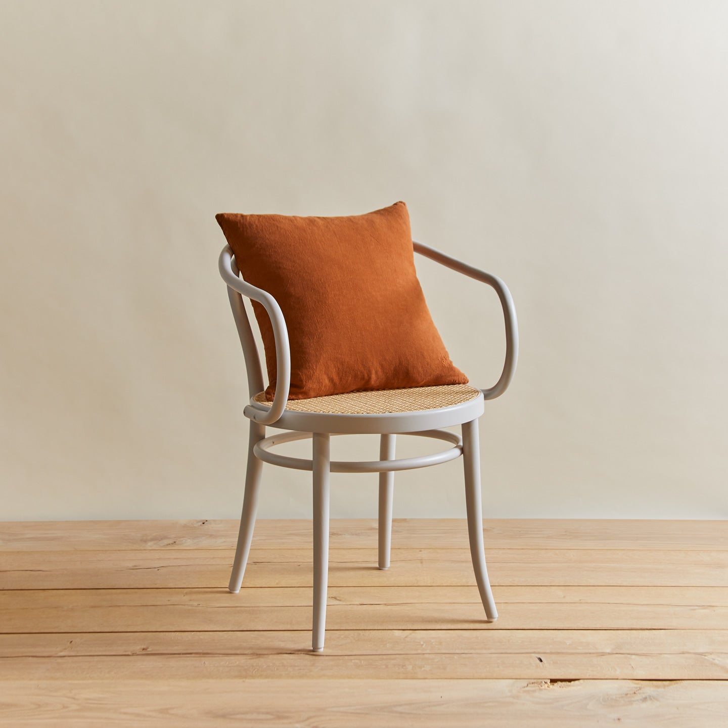 Simple linen pillow in terracotta