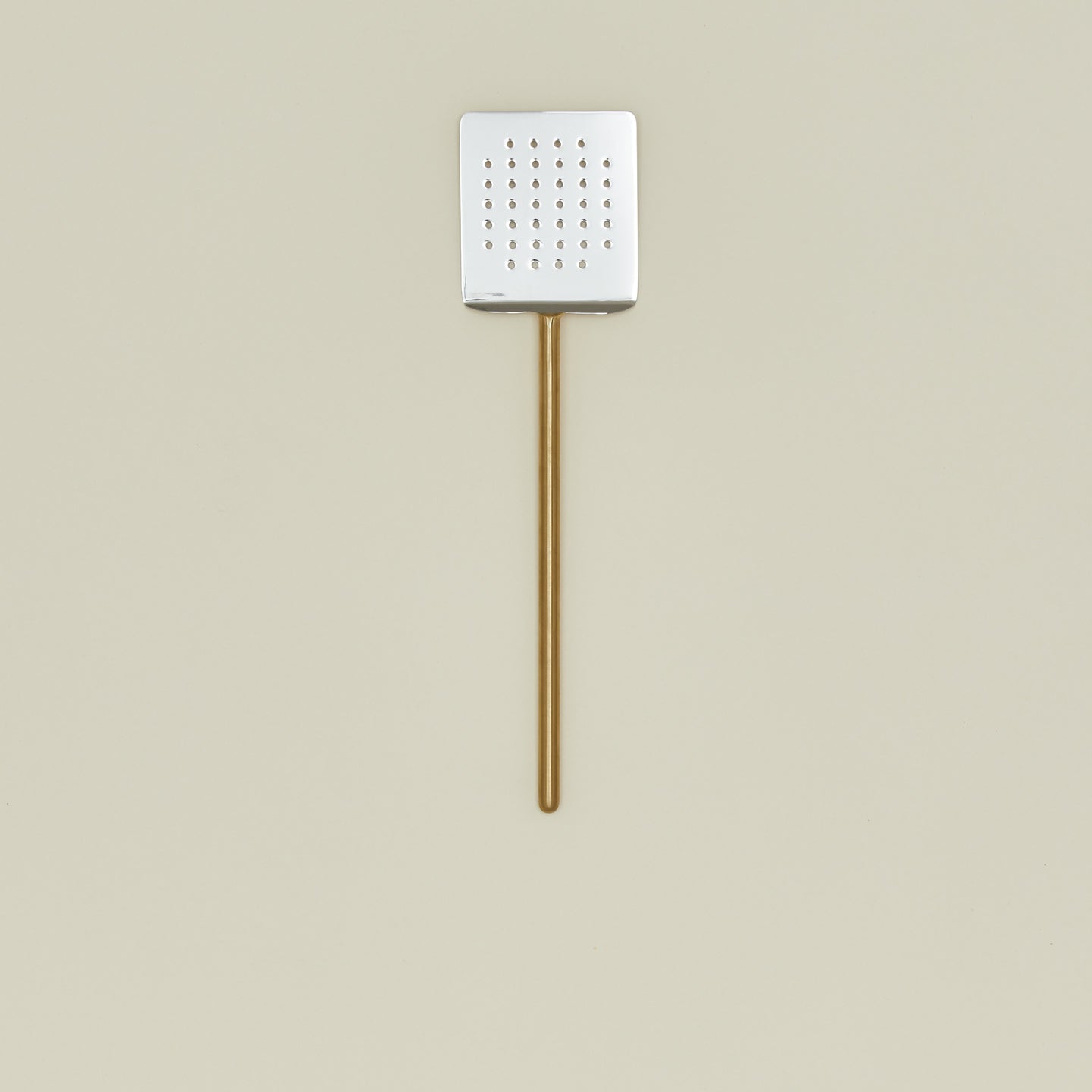 Simple metal spatula in brass