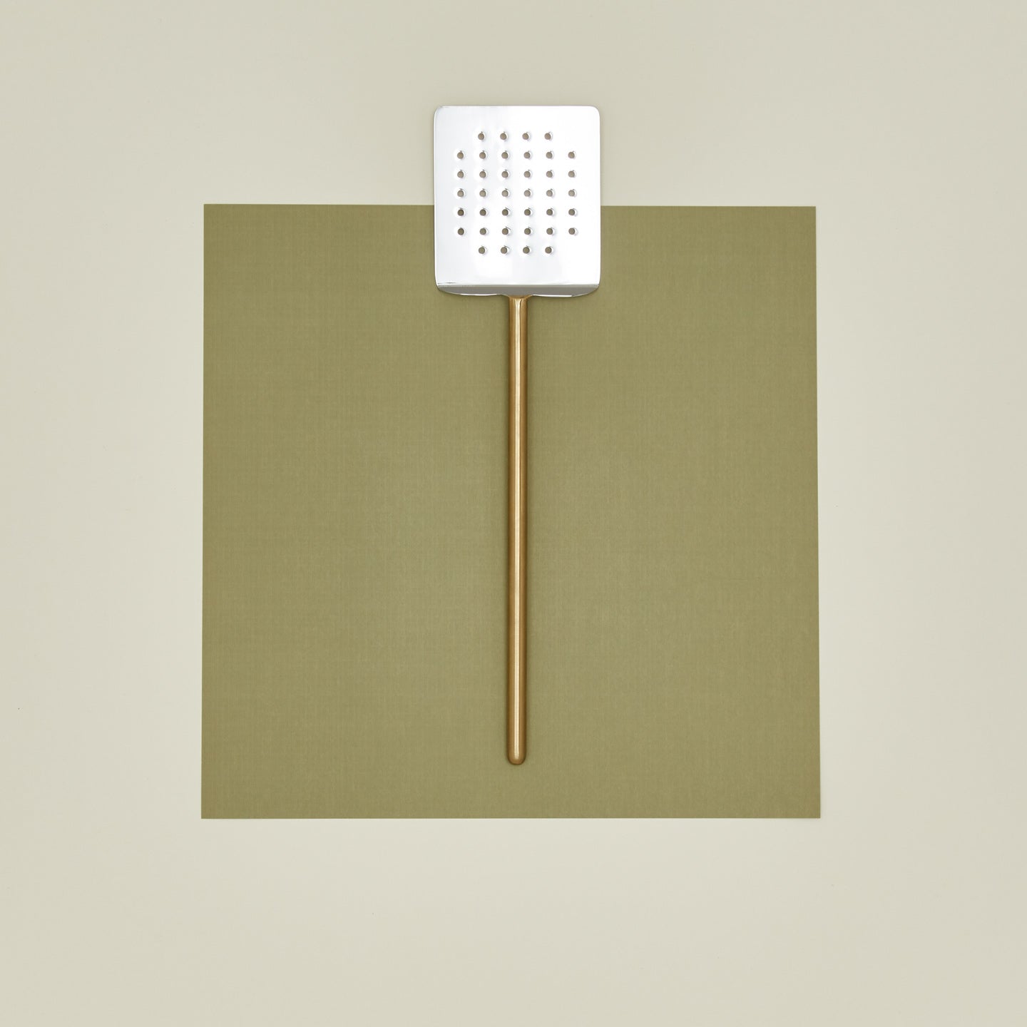 Simple metal spatula in brass
