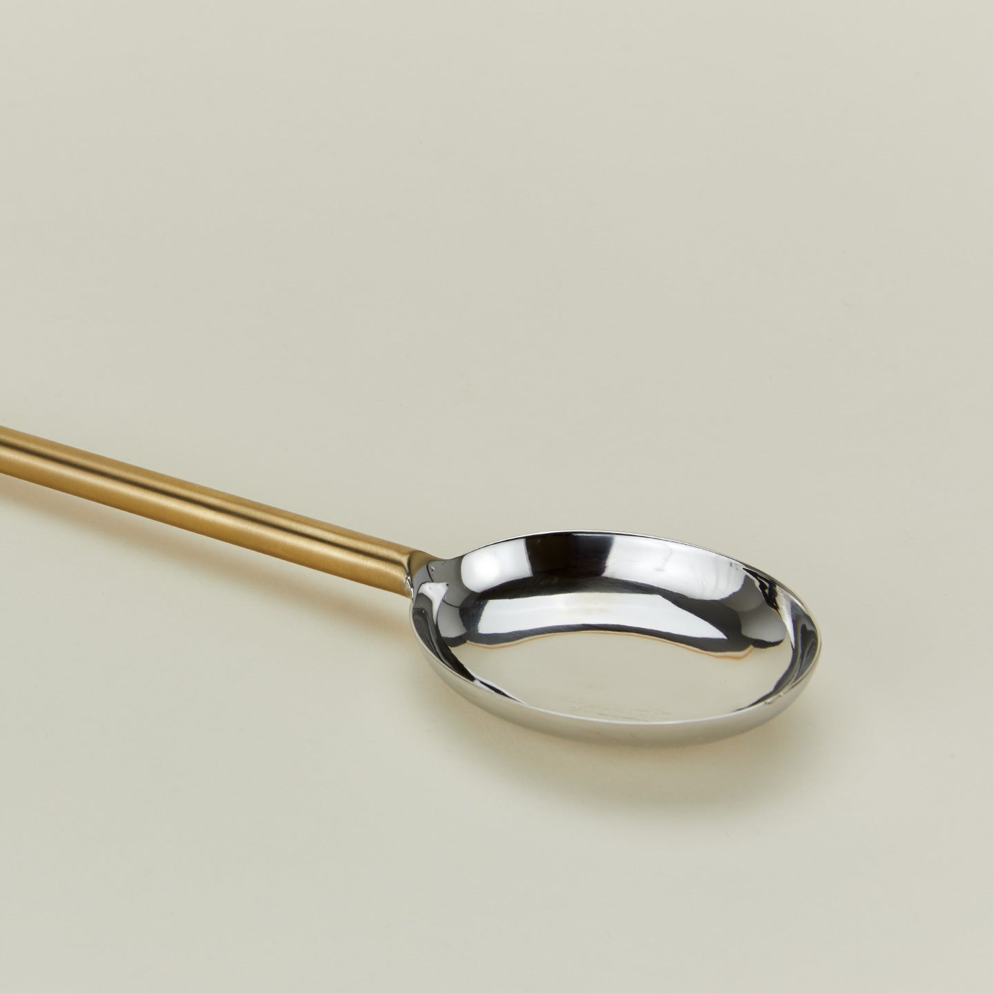 Close up view of Simple metal spoon in brass