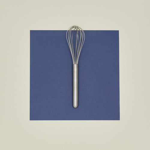 Simple metal whisk in silver