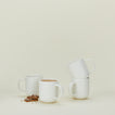 Simple porcelain mug set of 4 in white with coffee and brittle