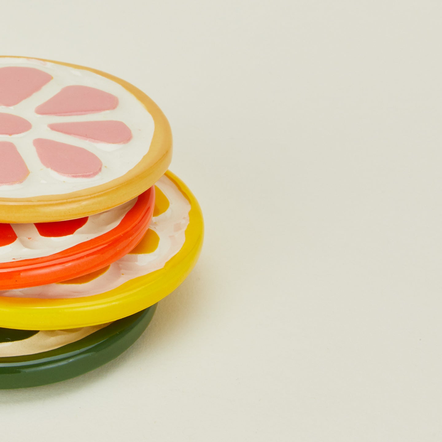 Close up view of Citrus Ceramic Coasters, Set of 4