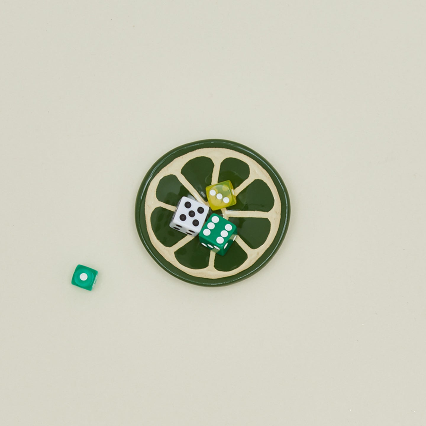 Overhead view of Citrus Ceramic Dish with dice