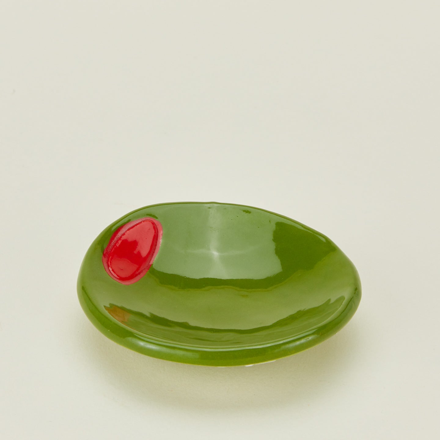 Detailed view of olive ceramic dish