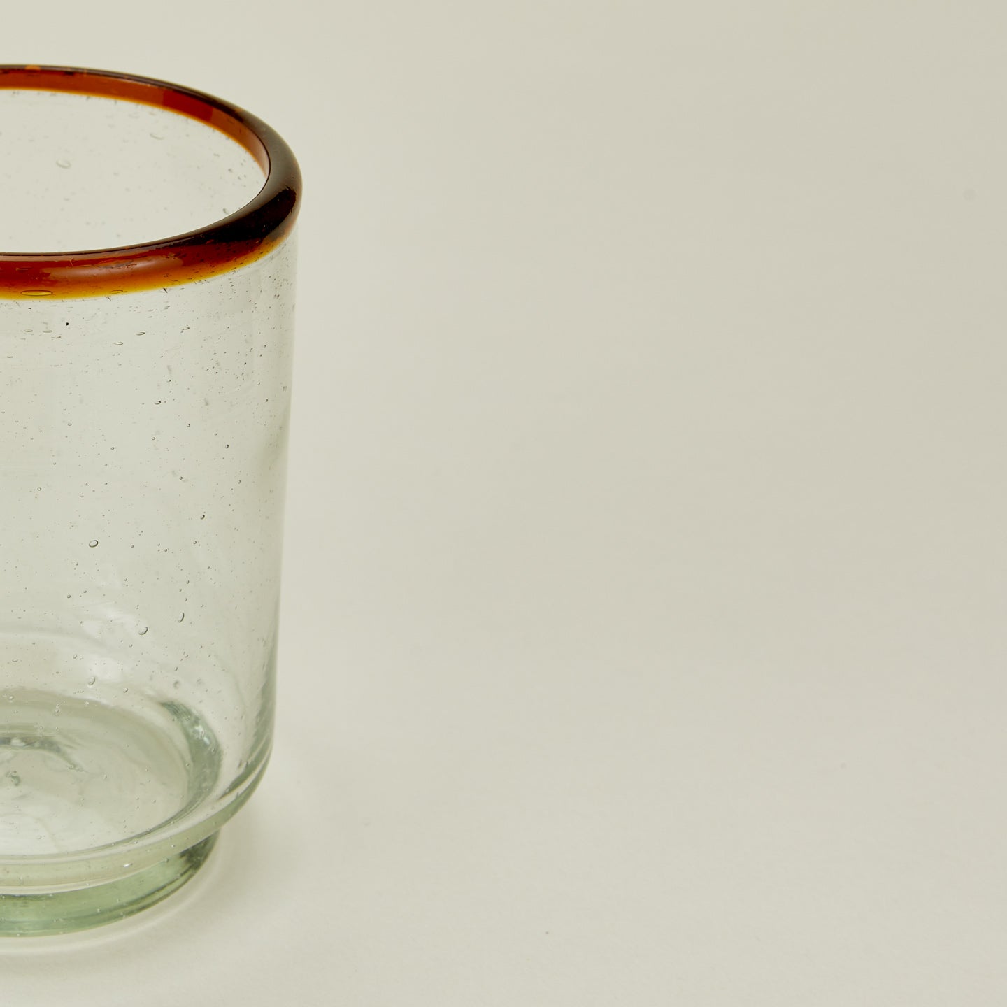 Close up view of Sobremesa amber rim glass