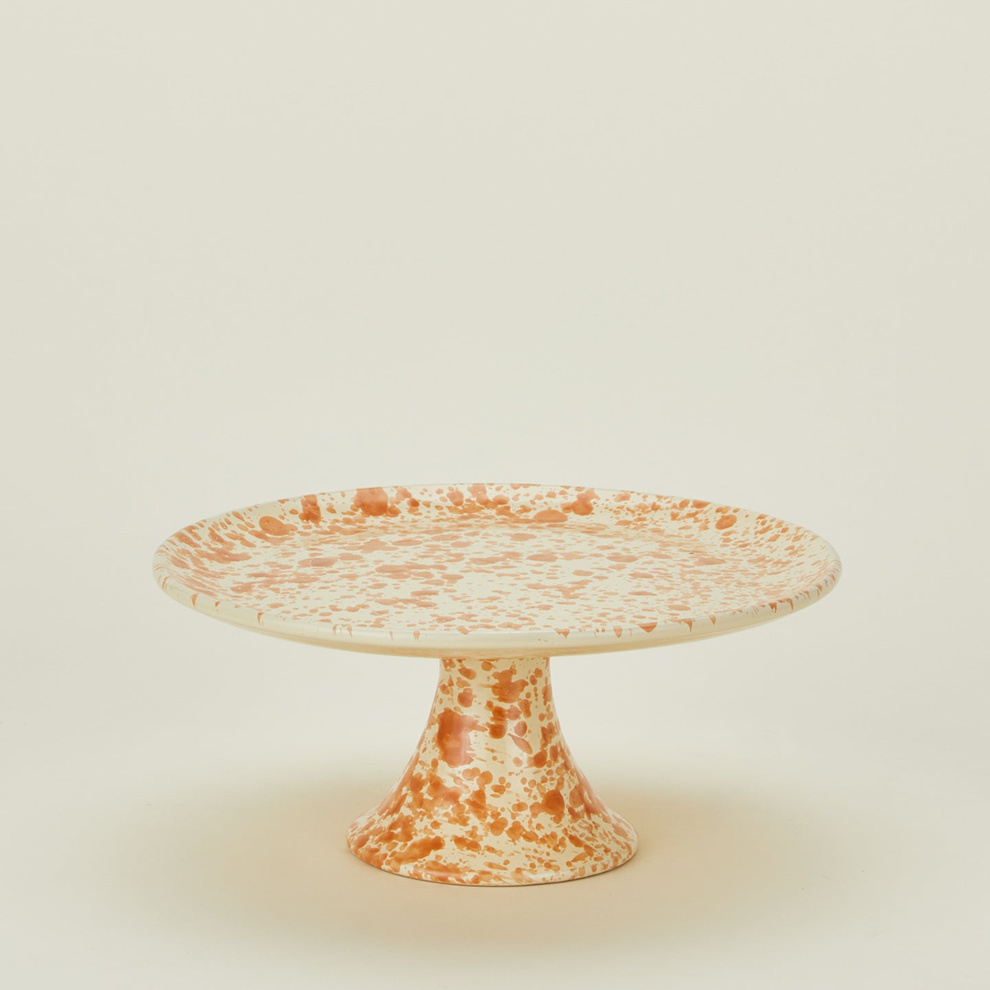 Splatterware cake stand in ivory and bronze