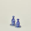 Large and small splatter candle stick holders in sky and cobalt