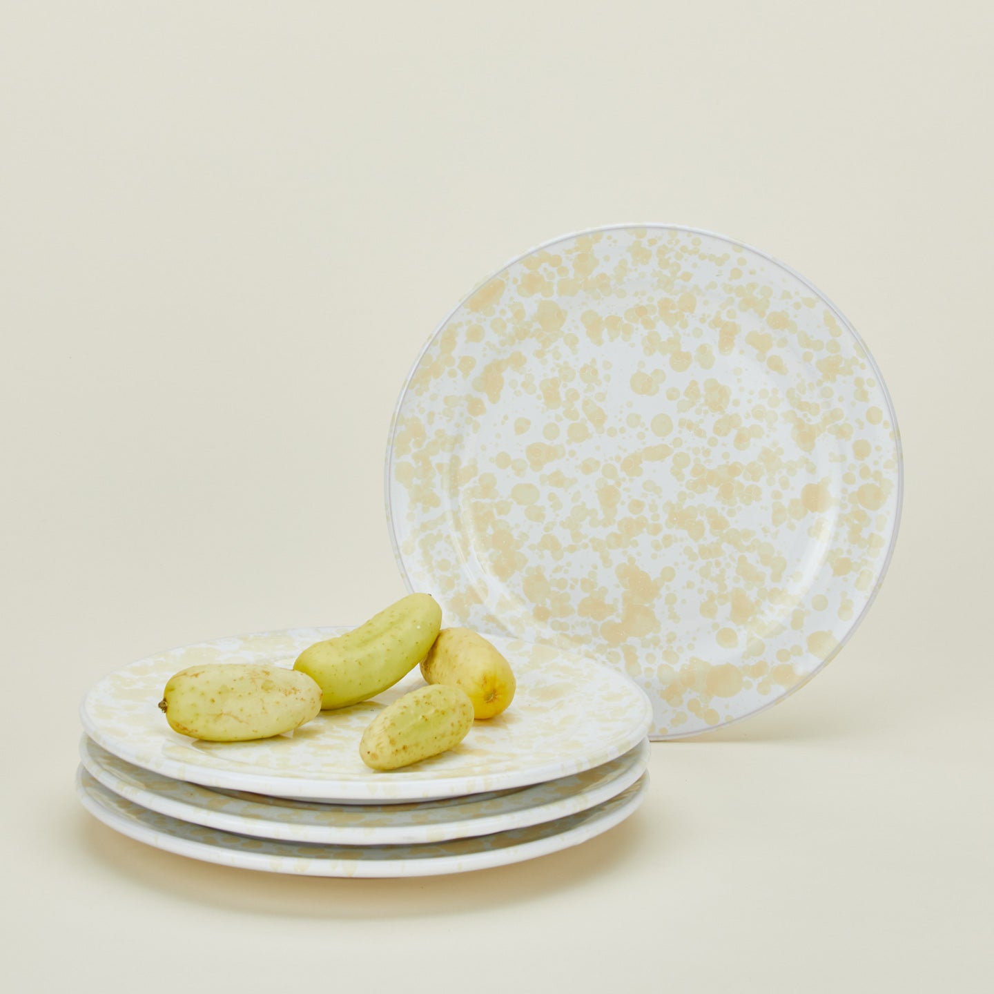 Splatterware dinnerplates set of 4 in white and ivory with zuchinni