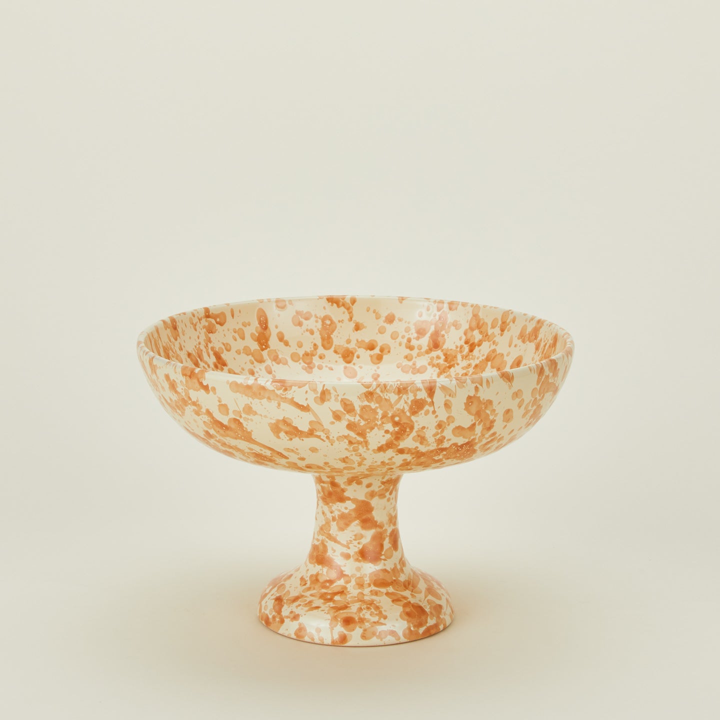 Splatterware footed bowl in ivory and bronze