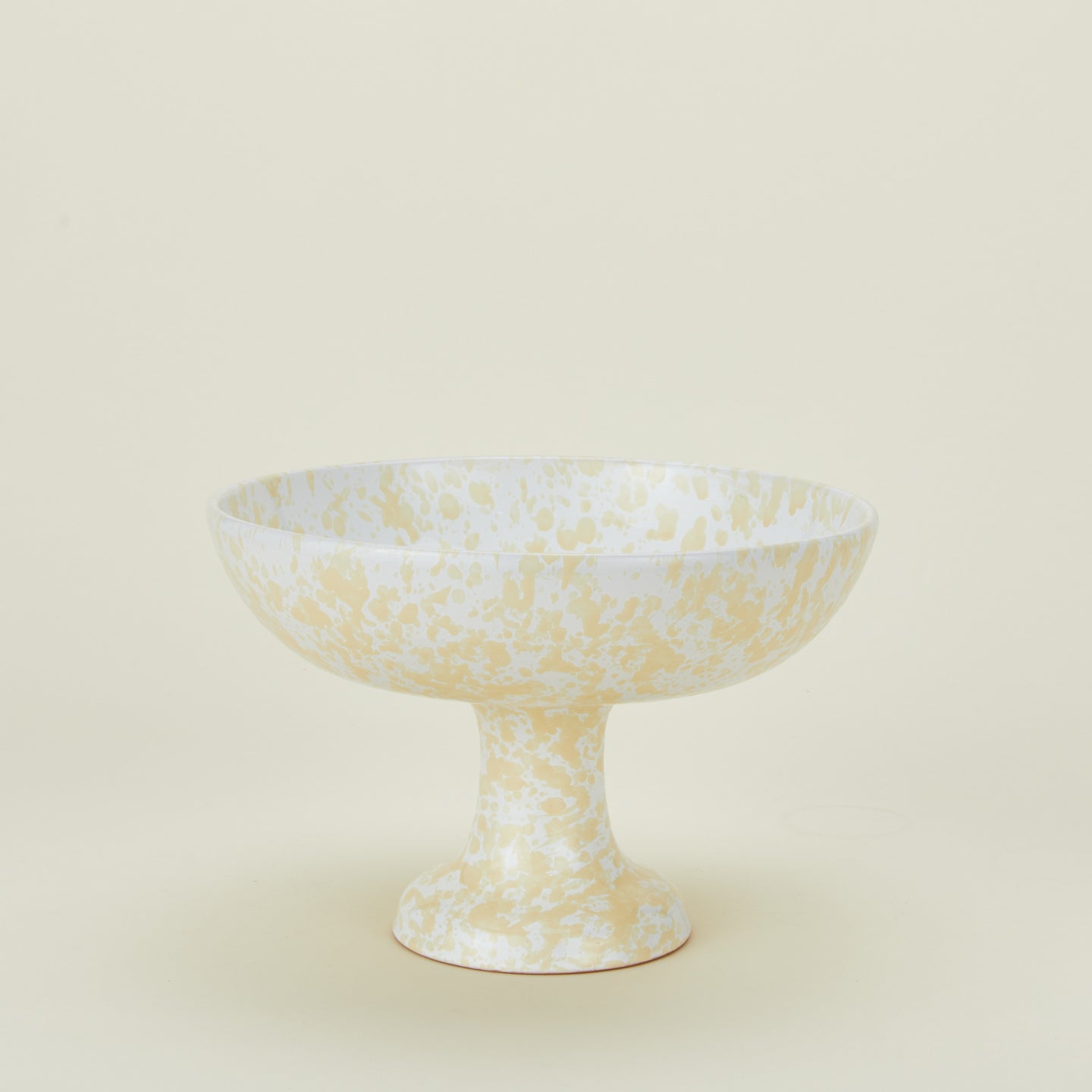 Splatterware footed bowl in white and ivory
