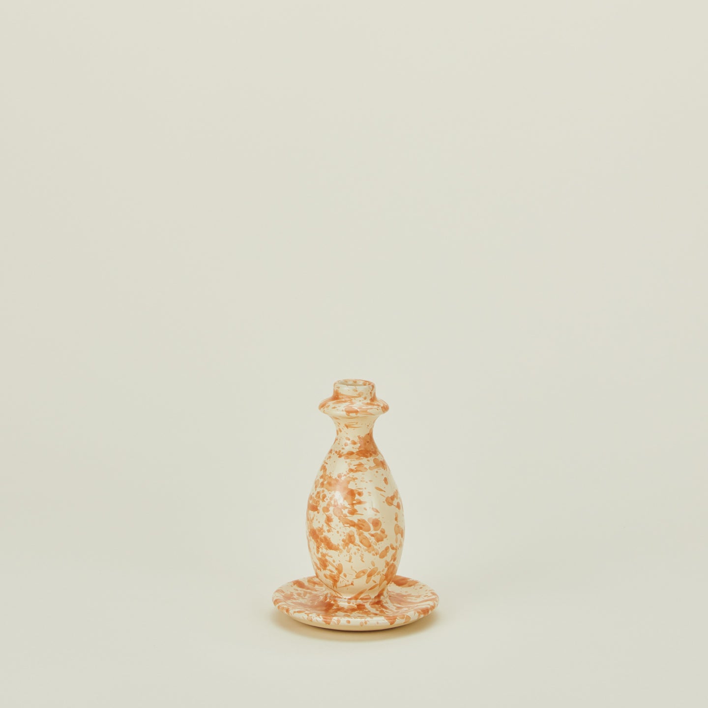 Large splatterware candlestick holder in ivory and bronze