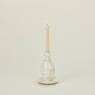 Large candlestick holder in white and ivory with candle